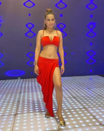 Nia Sharma looks smoking hot in a sexy red outfit