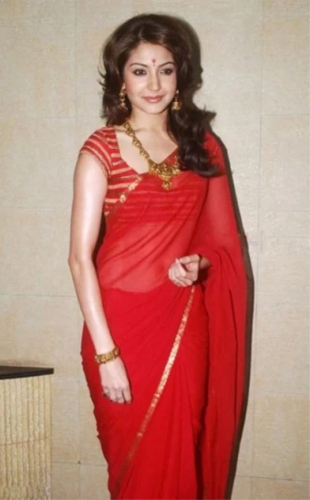 Anushka Sharma Looks Stunning in a Red Saree