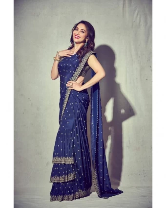 Madhuri Dixit keeps it playful in the stitched tiered saree