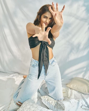 Pooja Hegde keeps it casual in the bralette and denims