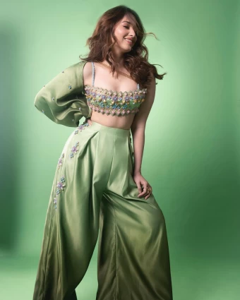 Tamannaah Bhatia looks stellar in a green fusion set, perfect for the festive season.