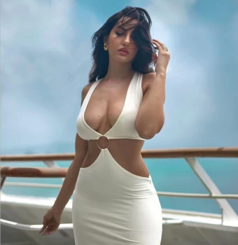 Nora Fatehi Sets Internet On Fire As She Flaunts Hourglass Figure In Sexy White Cutout Dress