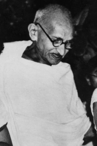 Mahatma Gandhi in the garden of his home.