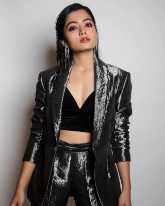 Rashmika Madanna looks sexy in a shimmery co-ord set and a deep neckline blouse.