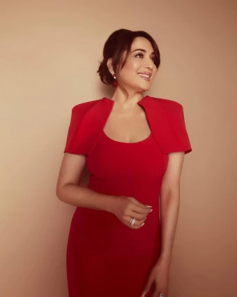 Madhuri Dixit Nene always looks charming in the colour red. Scroll ahead to take a look