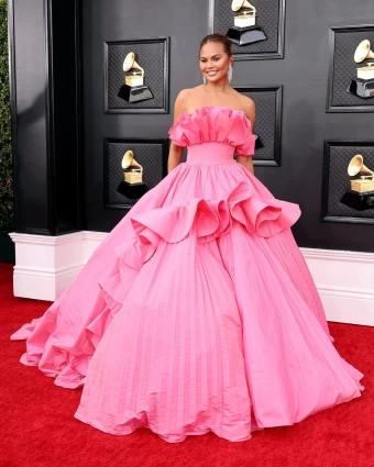 Chrissy Teigen gve princess vibes in the ballroom-style gown by Nicole Felicia