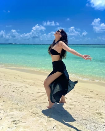 Raai Laxmi looks like a mermaid in the black bikini and matching bottoms