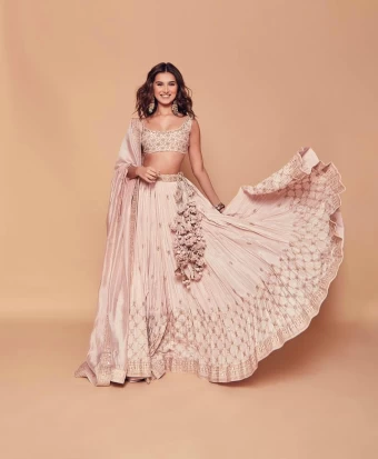 Tara Sutaria is a sight to behold in the pastel pink lehenga