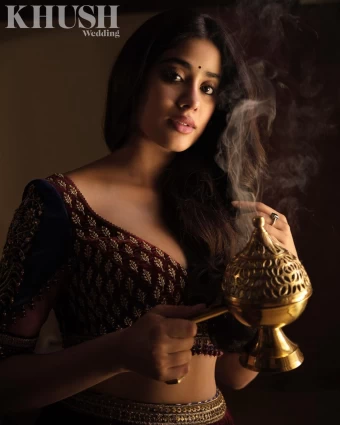 Janhvi Kapoor looks stunning in the blouse with a plunging neckline