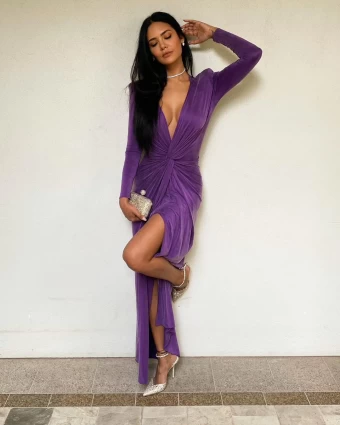 Esha Gupta flaunts her curves in the purple pleated dress