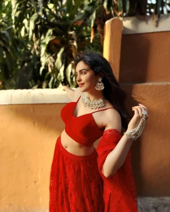 The actress takes ethnic red look on top, leaving the fans stunned by her beauty