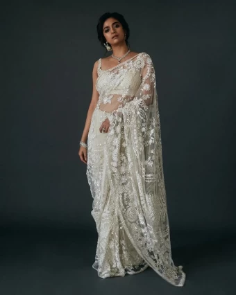 Keerthy Suresh looks spell-binding in the white saree
