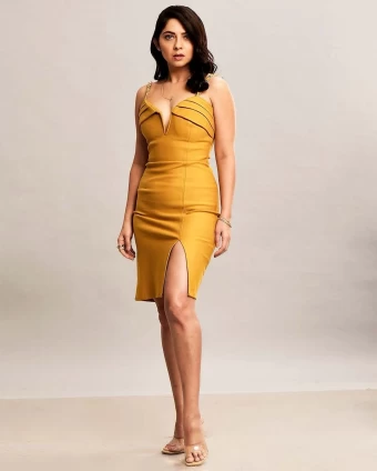 Sonalee pulls off a bold look in a mustard dress with minimal make-up like a pro