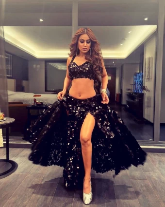 Nia Sharma Oozes Oomph In Black Sequinned Lehenga