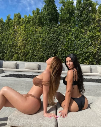 Kylie and her older sister Kim served looks in this iconic sister bikini picture