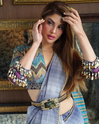 Jacqueline Fernandez accessorises the look with an ornate belt