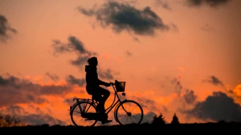 fitness cycling at sunset