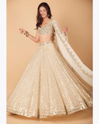 Ananya Panday looks graceful in the ivory mirrorwork lehenga