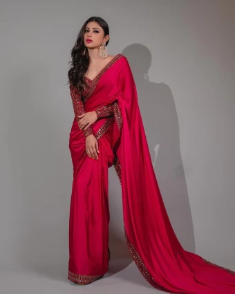 Mouni Roy looks breathtaking in a deep red saree