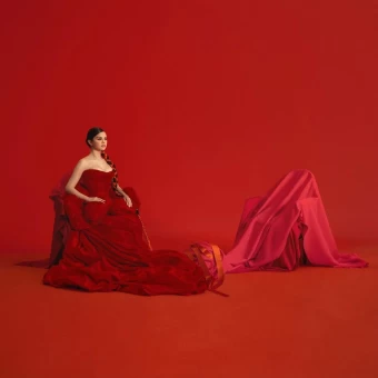 Sharing this oh-so-classy picture in a long red gown - Selena Gomez