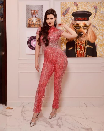 Giorgia Andriani looks hot in the shimmery red jumpsuit
