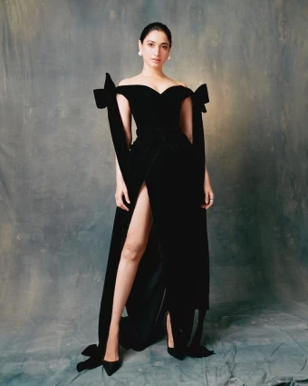 Tamannaah Bhatia is a picture of elegance in the black dress with a thigh-high slit