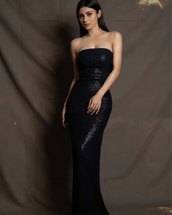 Mouni Roy is raising temperature in a slinky black column gown.