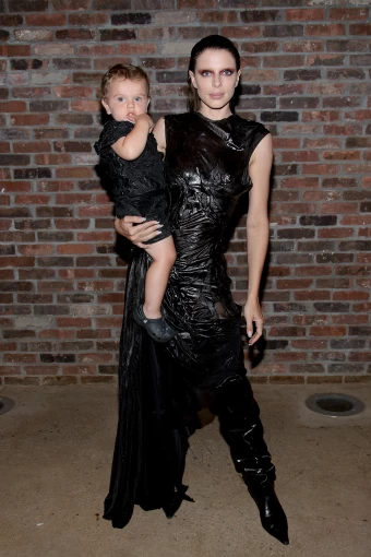 Fox showed up at the Elena Velez show with son Valentino in tow â€” and the duo even matched in glossy black getups