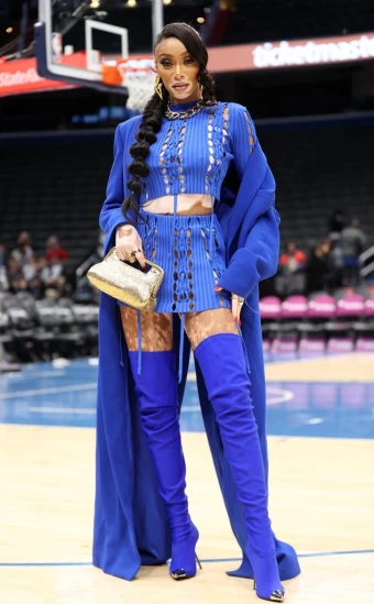Model Winnie Harlow steals the spotlight at a Washington Wizards game