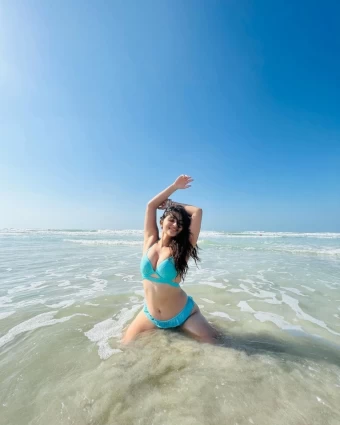 Vacation Photos of Kayadu Lohar Chilling in Blue Bikini Beside Beach