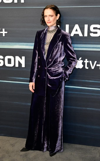 Actress Eva Green sports a plush purple suit with a lace blouse at the Liaison premiere in Paris