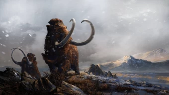 Mammoth Traversing Snowy Landscape Wallpaper