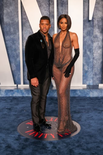 Ciara and husband Russell Wilson coordinated in black velvet on the Vanity Fair Oscar Party 2023 red carpet, but the singer’s look showed tons of skin.