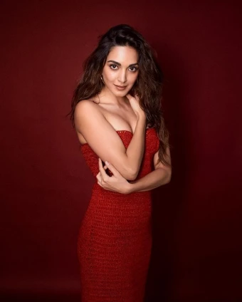 Kiara Advani looks stunning in her red bodycon outfit. Her dress is the perfect mix of classy and sassy looks