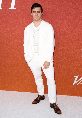 Chris Olsen opted for this white suit with a sheer white crochet top beneath & a pair of brown leather shoes at Variety’s Power of Young Hollywood event in Los Angeles