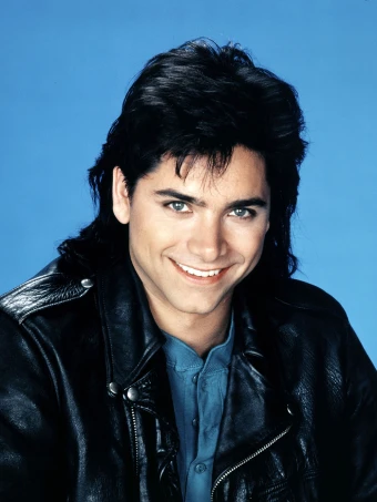 John Stamos in a promo photo for ‘Full House’ in 1989. He played Jesse in the television series and rocked a mullet in the first season.