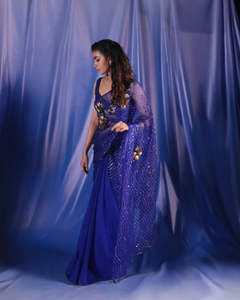 The saree featured intricate sequin work that added a touch of glamour and sophistication.