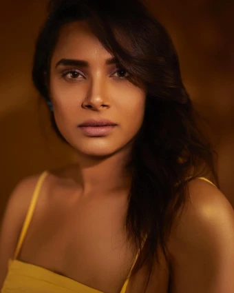 Confident and Glamorous: Hariteja Rocks Yellow Mini Dress