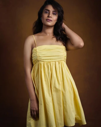 Confident and Stylish: Hariteja Turns Heads in Yellow Mini Frock