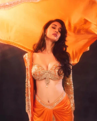Fiery Orange Elegance, Redefined by Disha