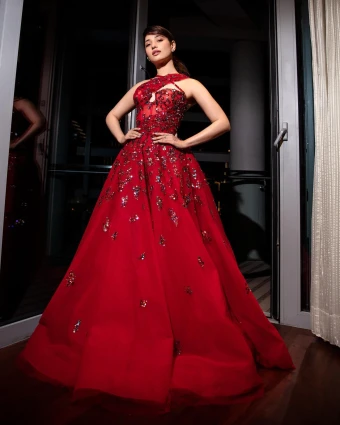 A ballroom-style gown has been made for the curvy girls. Tamannaah Bhatia shows how to wear it with elan.