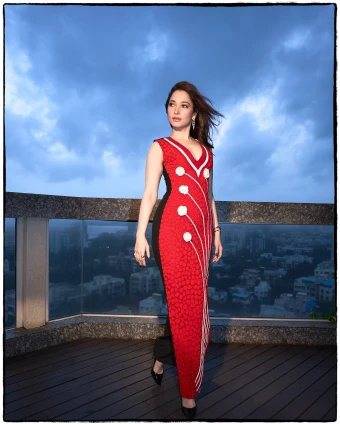 If you are feeling a little conscious of your curves, wear an illusion dress to create a fine balance. This red and black dress worn by Tamannaah does it so well, right?