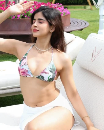 Soaking up the sun in style, Sakshi proves that confidence and a hint of tropical tease are summer’s best accessories.