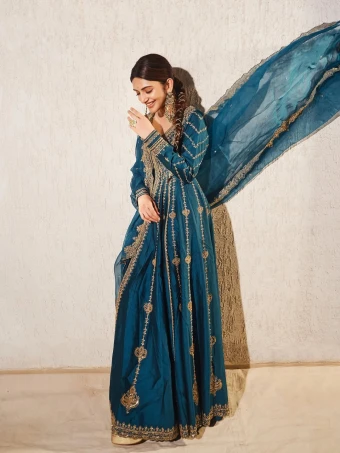 c exuded elegance in a bright blue floor-length anarkali for her Diwali celebration