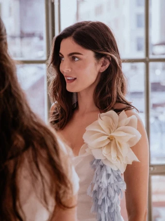 A candid behind-the-scenes moment captures Monica Barbaro before hitting the One Night Only red carpet.