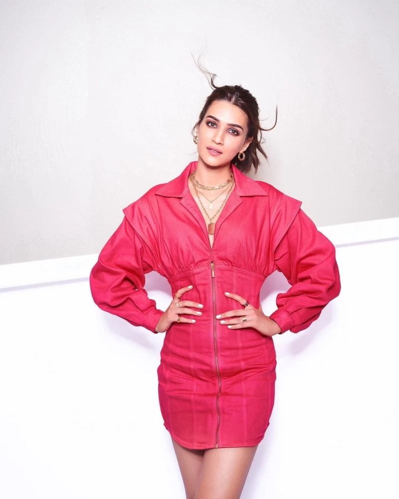 Kriti Sanon looks super-chic in a pink zip-up dress with gold chains