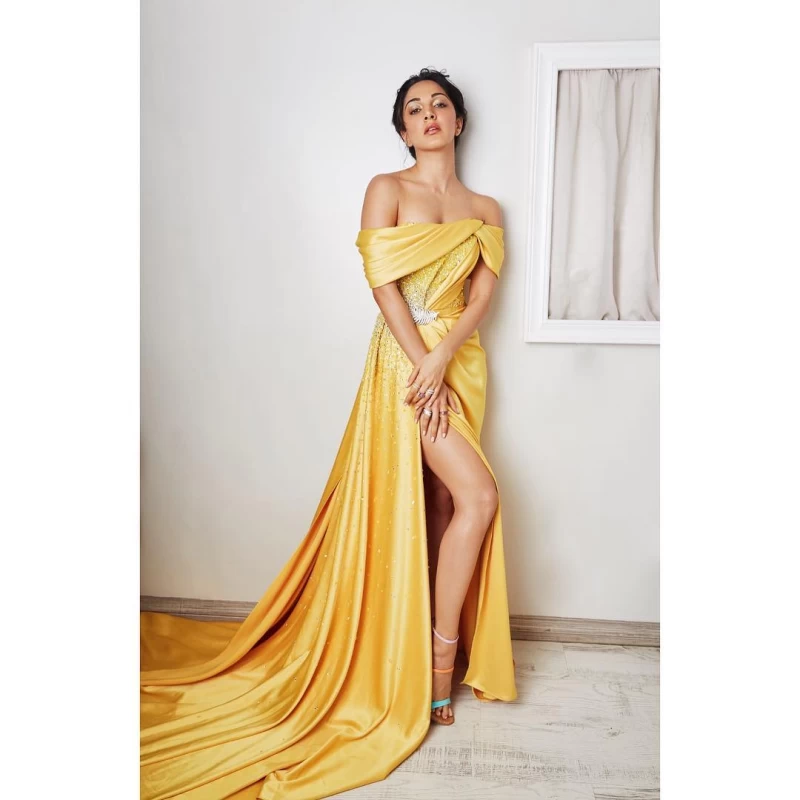 Kiara Advani oozes oomph in this sizzling yellow thigh high slit yellow dress