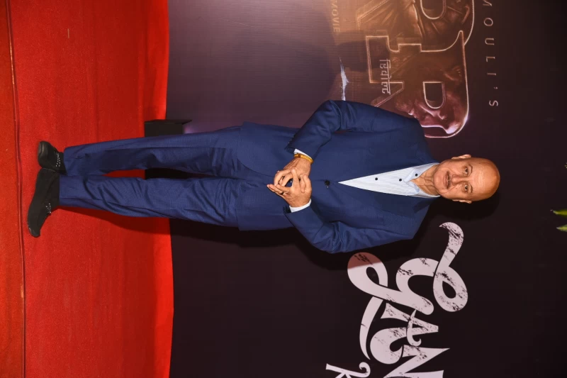 Anupam Kher poses on the red carpet