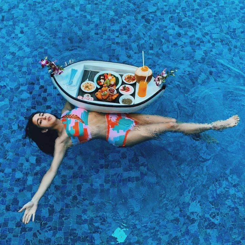 Sara Ali Khan enjoys her floaty breakfast in a blue and red bikini