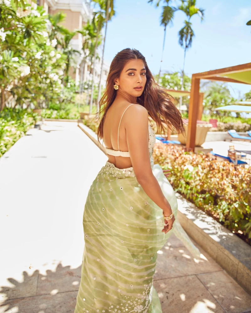 Pooja Hegde looks stunning in the green printed saree